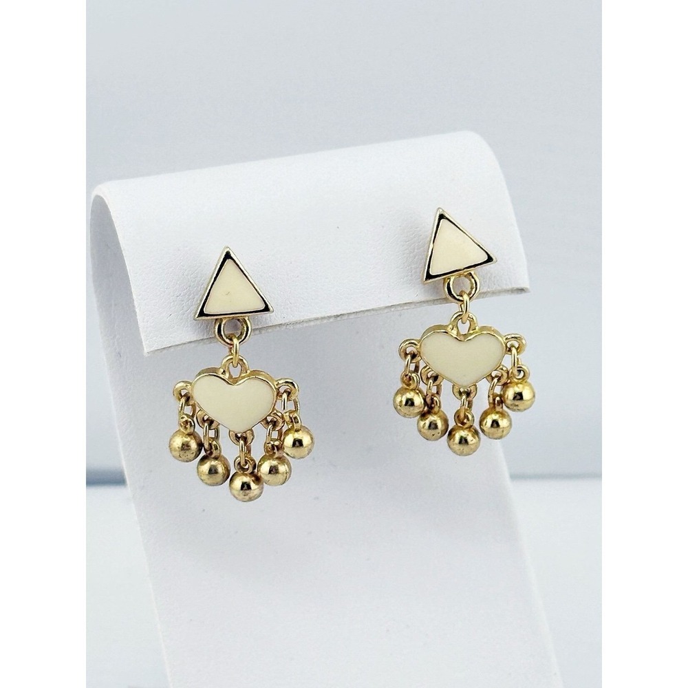 Vintage geometric & heart shaped, gold toned and ivory colored pierced earrings.